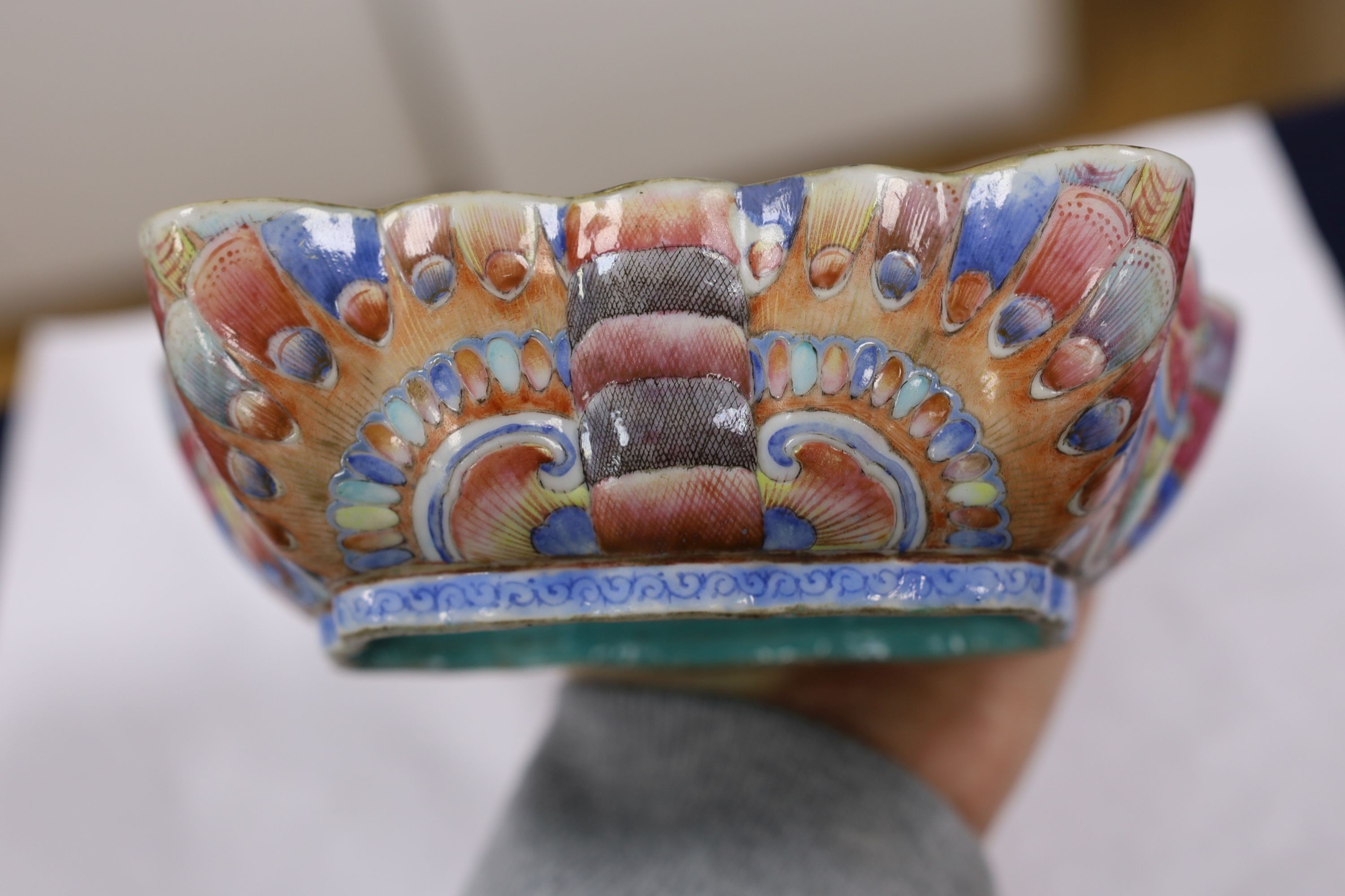 A Chinese enamelled porcelain ‘butterfly’ dish, 19th century, ground off reign mark, 19 cms wide at the front.